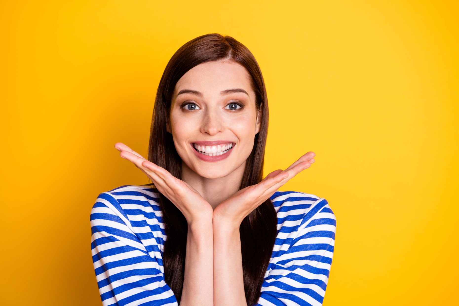 A cheerful young woman with a healthy beautiful smile